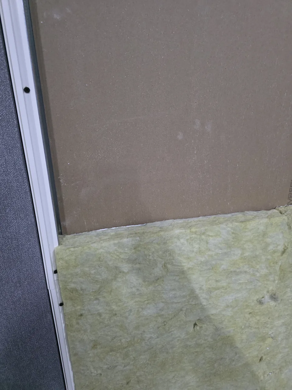 Close-up of the rockwool insulation in the window opening